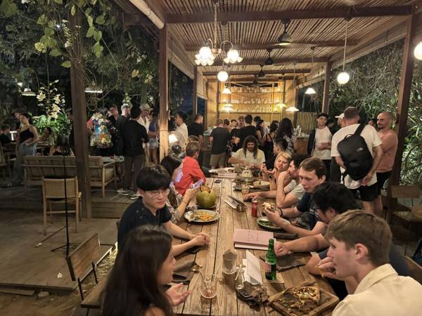 Founders talking along a long shared table